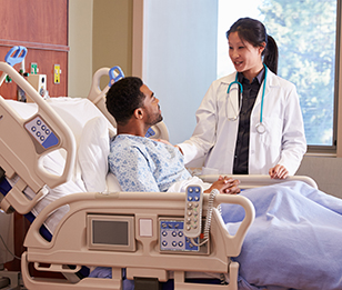 A doctor talking to a patient.