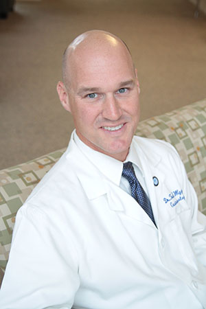 Dr. Travis Wiggins