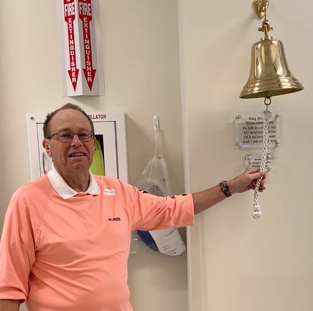 Taylor Evans ringing the bell