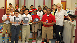 St. Joseph's/Candler Angels of Mercy volunteers with students and faculty at Garden City Elementary School