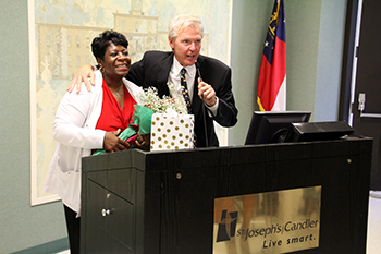 St. Joseph's/Candler President & CEO Paul P. Hinchey congratulates the 24th James R. Lientz Humanitarian, Elaine Connor