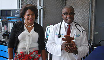 Dr. Eugene Nwosu, a longtime Savannah cardiologist, stands with his wife, Mary, during a presentation