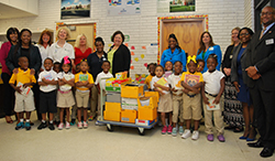 St. Joseph's/Candler Angels of Mercy volunteers with students and faculty at Spencer Elementary School