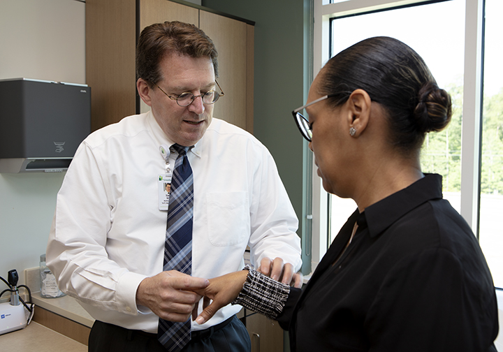 Dr. Steven Greer with patients