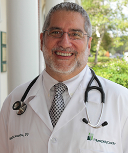Dr. Charles Sevastos