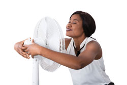 Keeping Your Cool stock - AA girl and fan